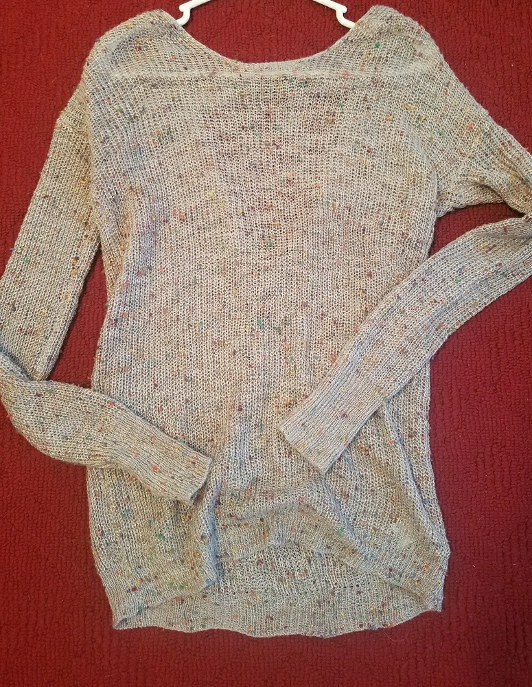 Grey open back lace up sweater.